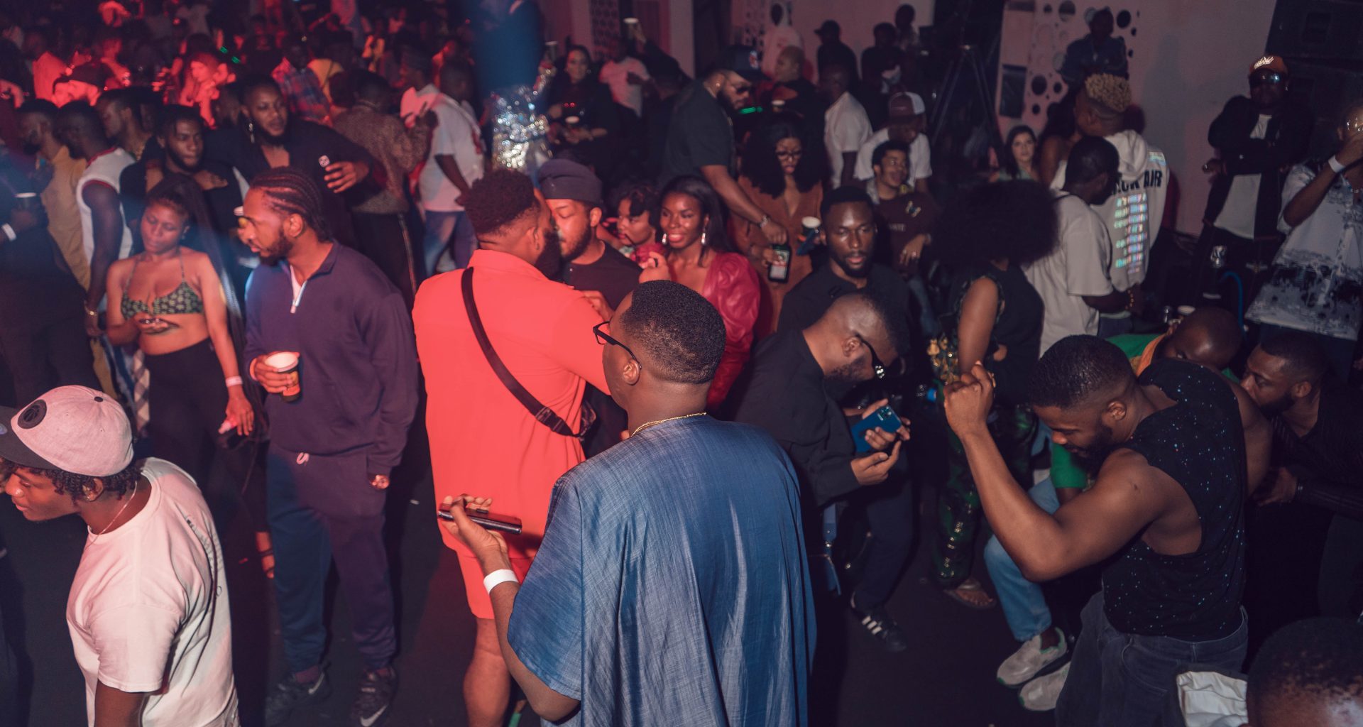 millennials in a Lagos party dancefloor