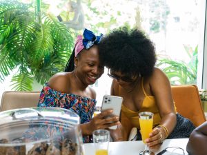 two weekenders sharing a moment over Sunday Brunch.