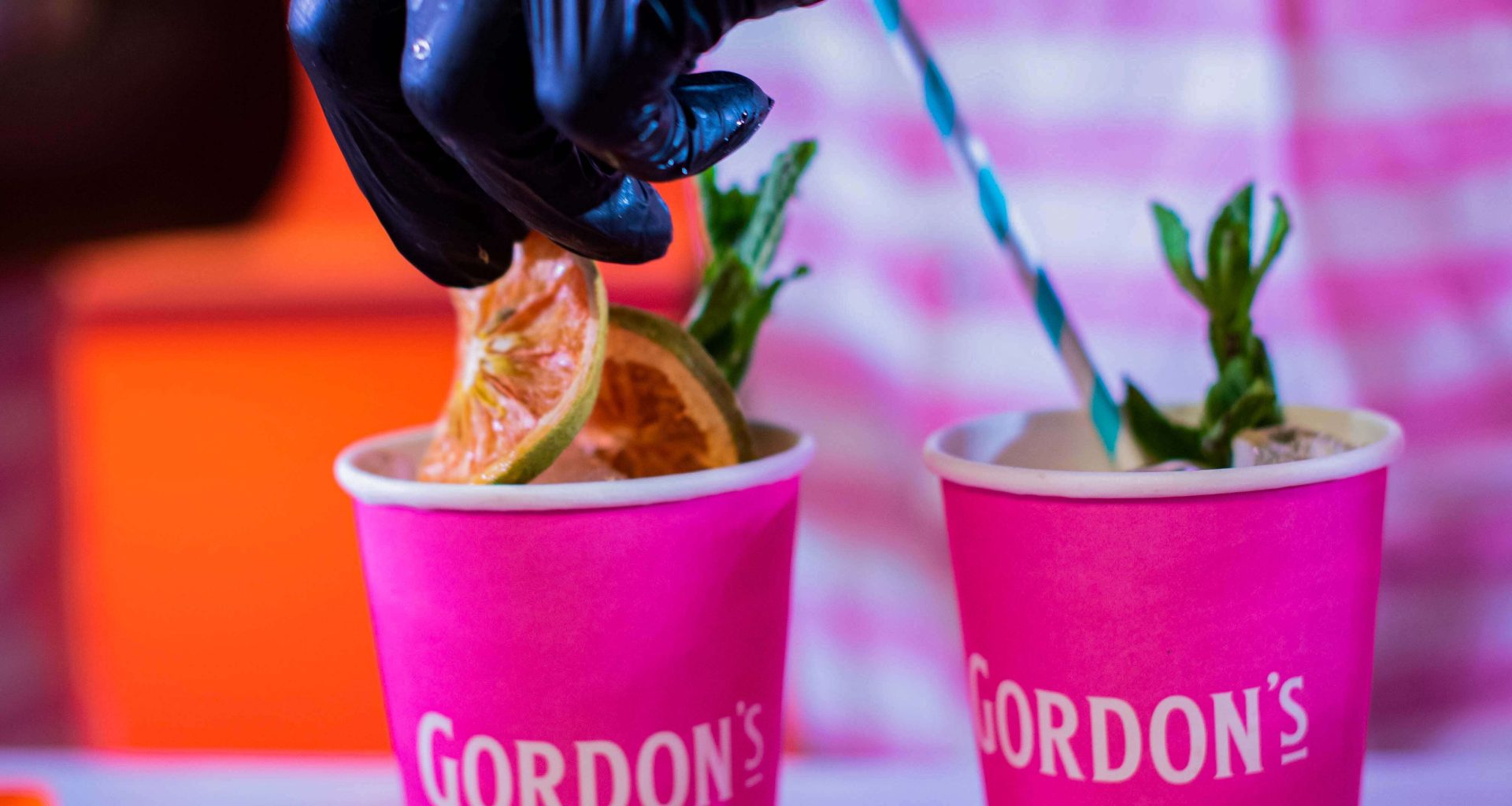 bartender preps a drink